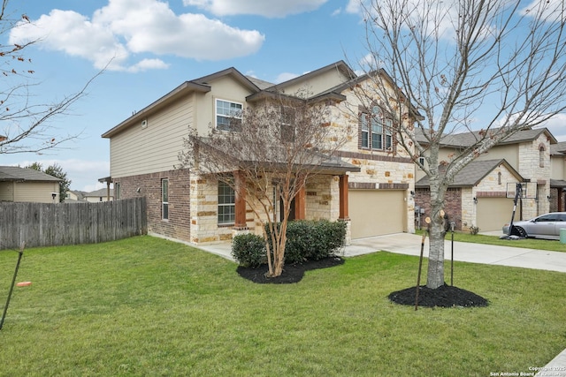 view of front of house with a garage and a front yard