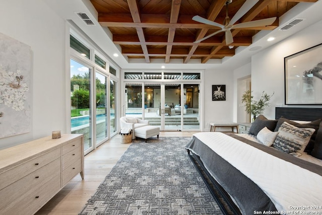 bedroom with light wood-type flooring, coffered ceiling, access to outside, beam ceiling, and wooden ceiling