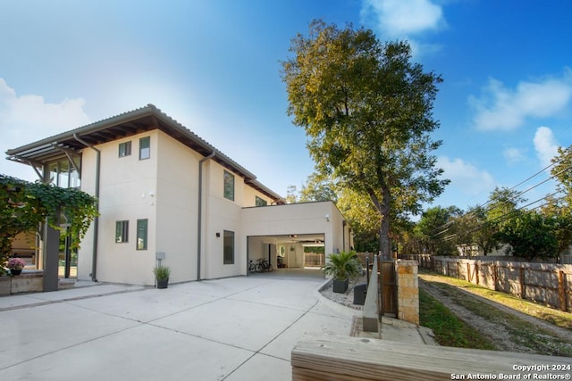 rear view of house featuring a patio