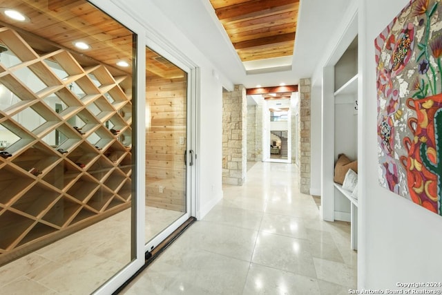 wine cellar with wood ceiling