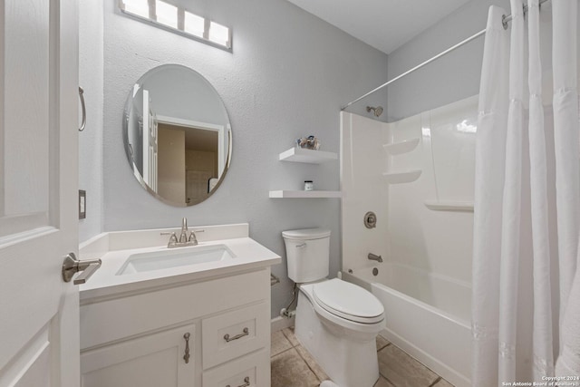 full bathroom featuring tile patterned flooring, vanity, toilet, and shower / bathtub combination with curtain