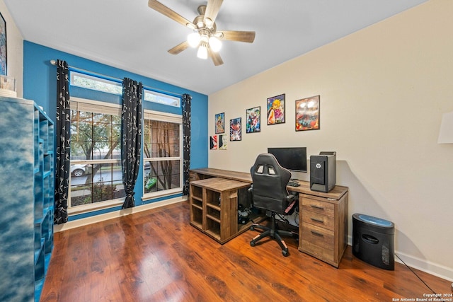 office with ceiling fan and dark hardwood / wood-style flooring