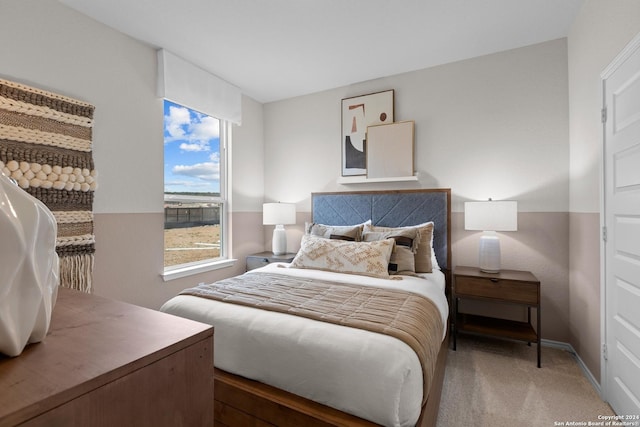 bedroom with dark colored carpet