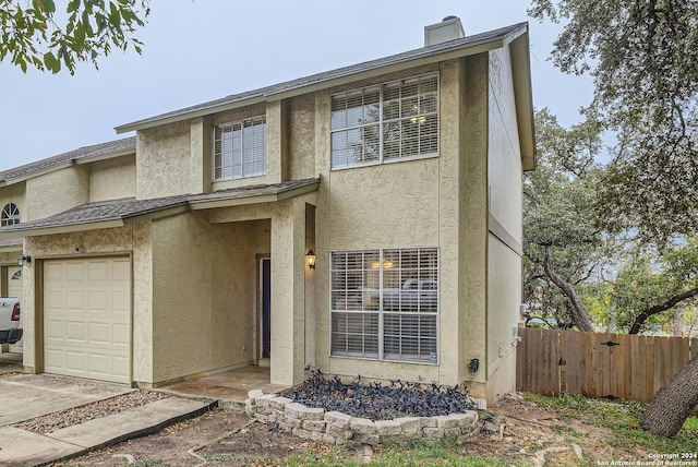 view of front of home with a garage