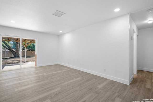 empty room featuring light hardwood / wood-style floors