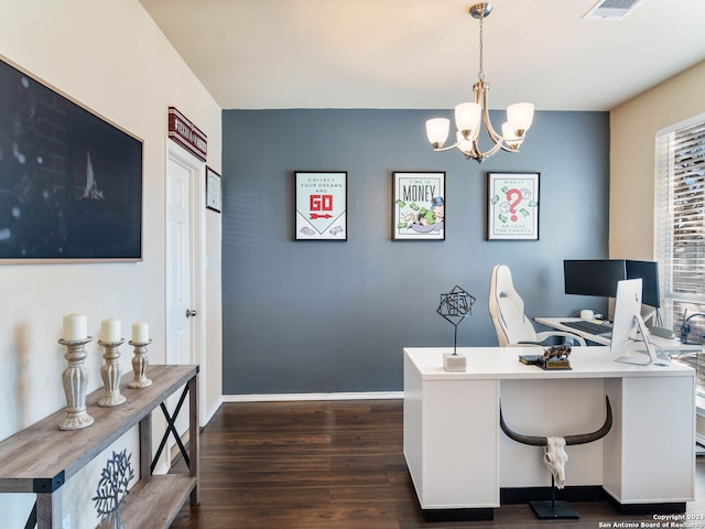 home office featuring dark hardwood / wood-style flooring and an inviting chandelier