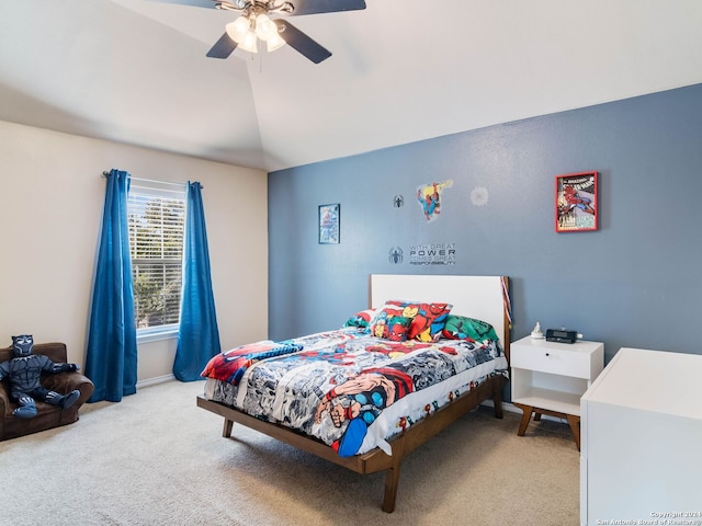 carpeted bedroom with ceiling fan and lofted ceiling