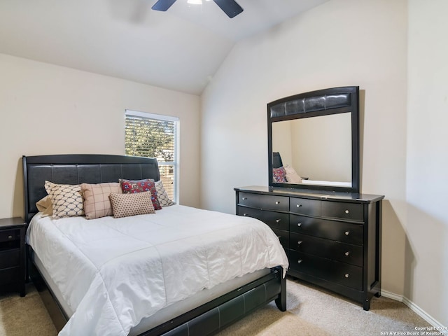 bedroom with light carpet, ceiling fan, and lofted ceiling