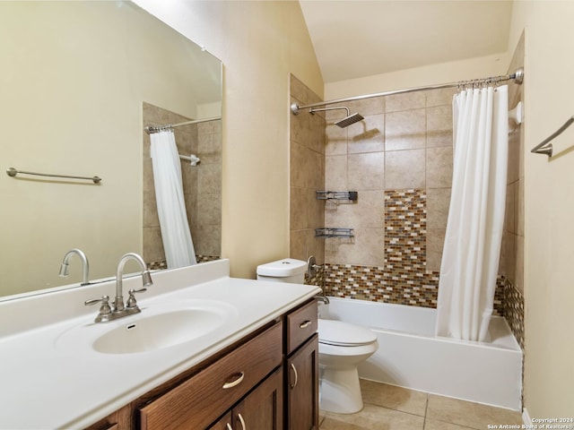 full bathroom with tile patterned flooring, lofted ceiling, toilet, shower / tub combo with curtain, and vanity