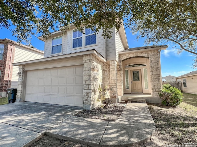 view of front of property with a garage