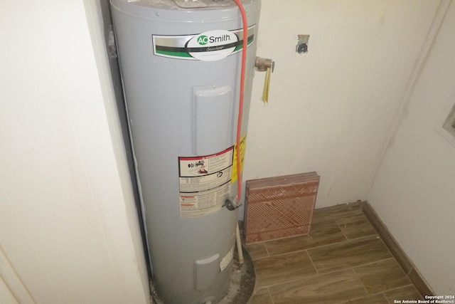 utility room with water heater