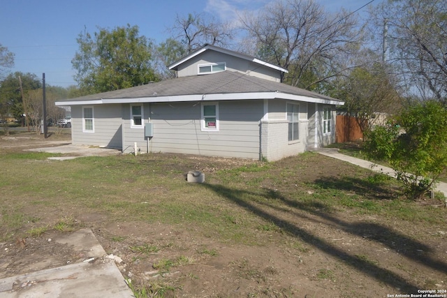 exterior space with a front yard