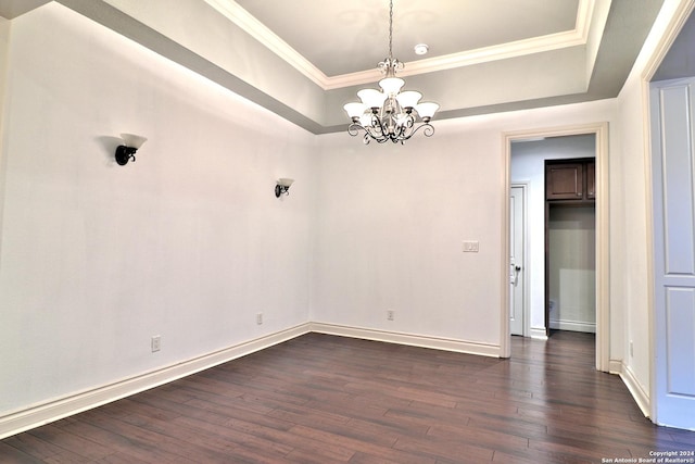 interior space with crown molding, a chandelier, and dark hardwood / wood-style floors