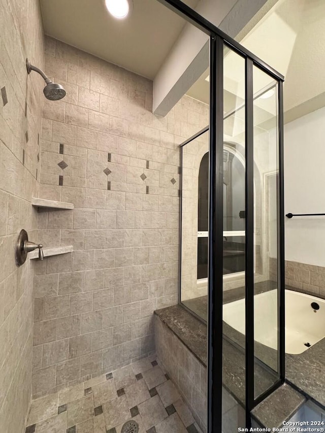 bathroom featuring walk in shower