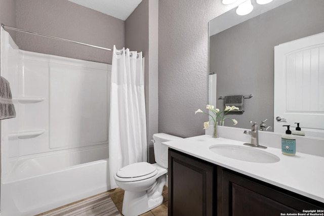 full bathroom featuring vanity, toilet, and shower / bath combo with shower curtain