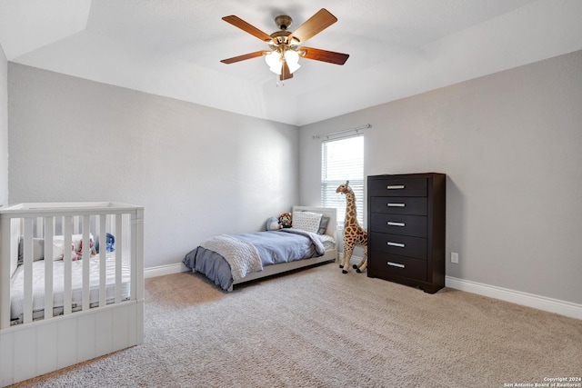 carpeted bedroom with ceiling fan