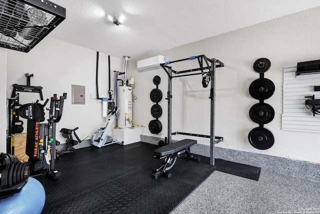 exercise area with a textured ceiling, gas water heater, an AC wall unit, and electric panel