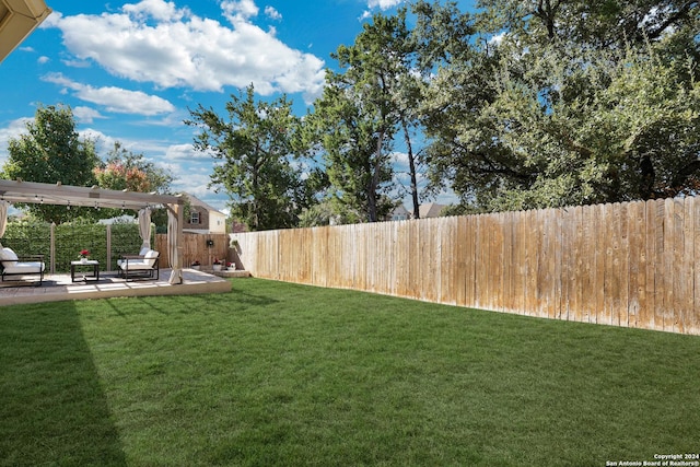 view of yard featuring a pergola and a patio