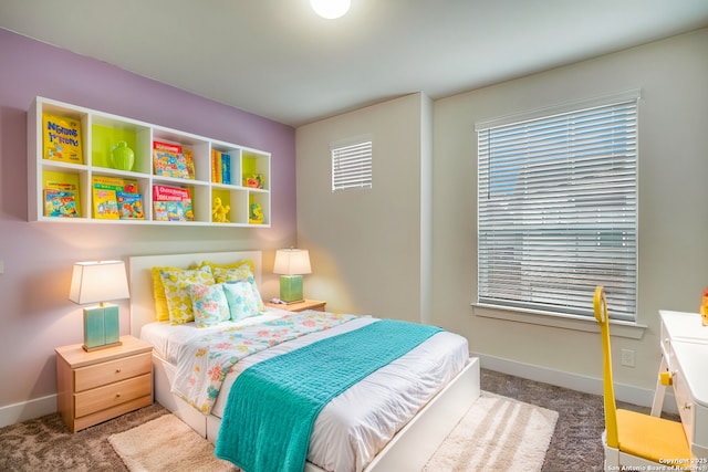 bedroom featuring carpet