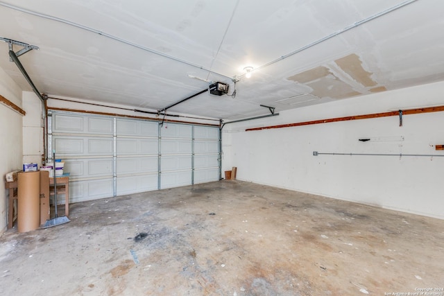 garage featuring a garage door opener