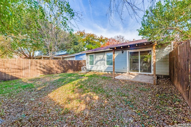 back of house featuring a patio