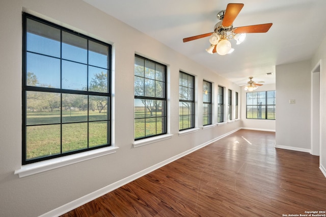 unfurnished sunroom featuring plenty of natural light