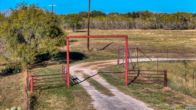 view of gate featuring a rural view