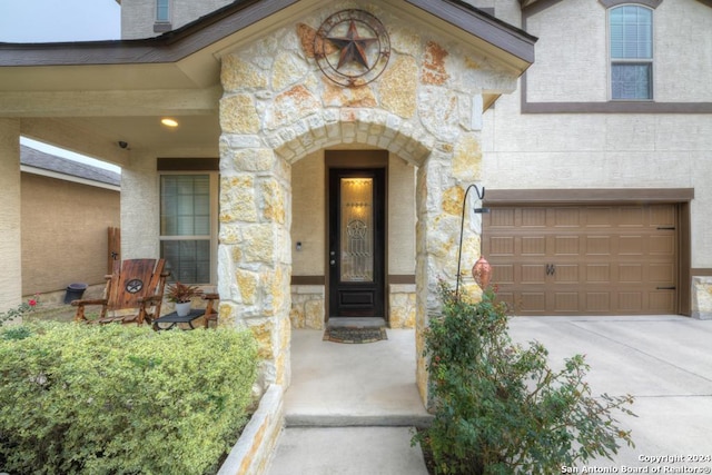 property entrance featuring a garage