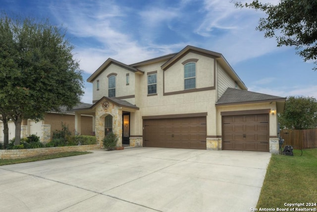 view of front of property featuring a garage