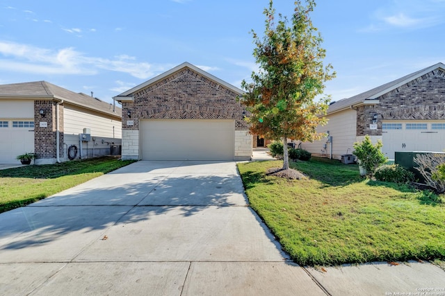 ranch-style house with a garage and a front yard