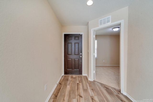 doorway to outside featuring light hardwood / wood-style flooring