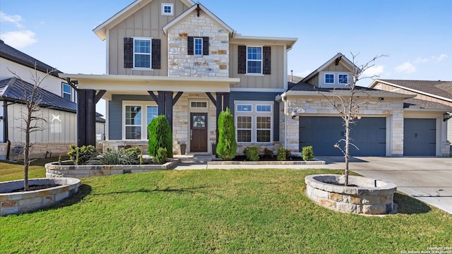 craftsman-style home featuring a garage and a front lawn