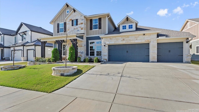 view of front of home featuring a front yard and a garage