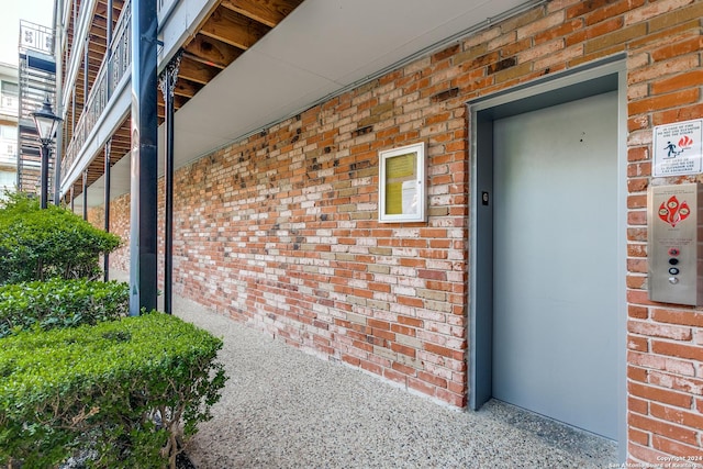 doorway to property with elevator