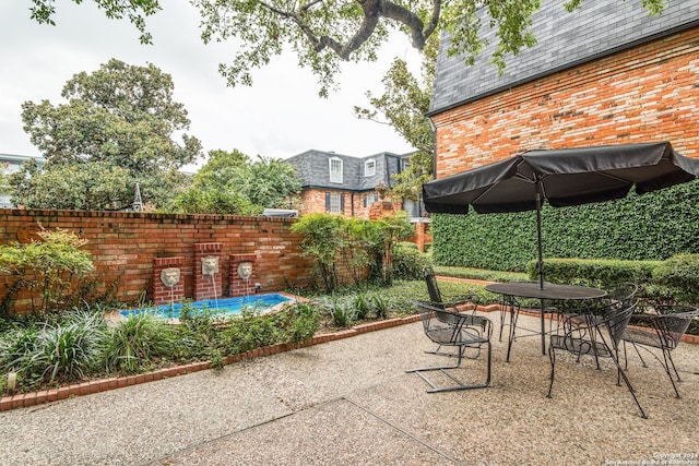 view of patio with a pool