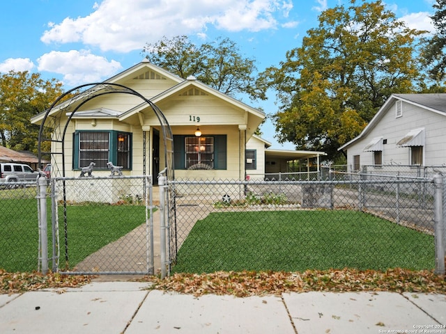 bungalow featuring a porch and a front yard