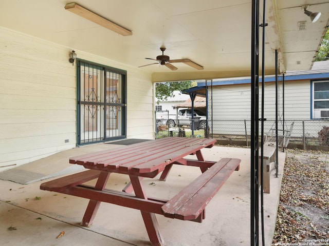 view of patio featuring ceiling fan