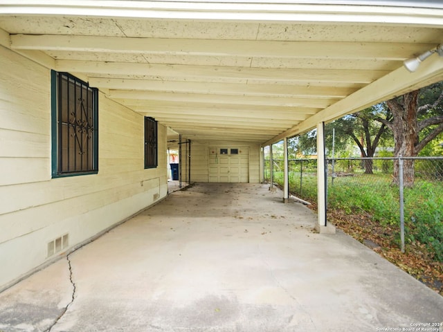 view of patio / terrace featuring a carport