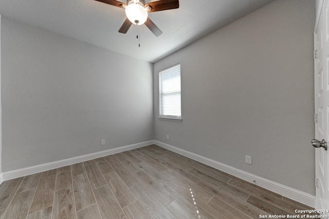 unfurnished room with ceiling fan and light hardwood / wood-style flooring