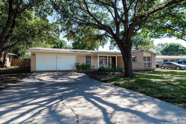 single story home with a garage