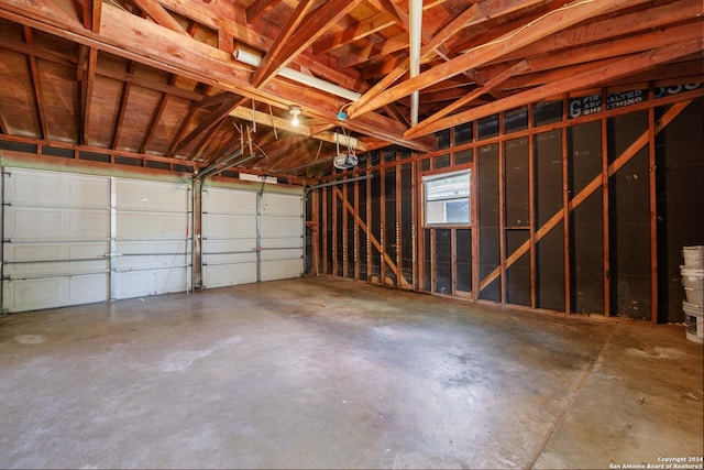 garage featuring a garage door opener