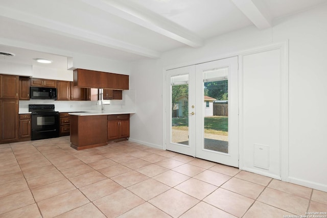 kitchen with light tile patterned flooring, sink, beamed ceiling, and black appliances