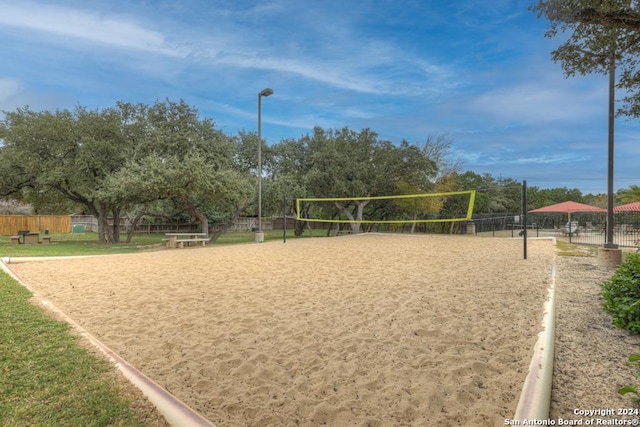 view of property's community featuring volleyball court