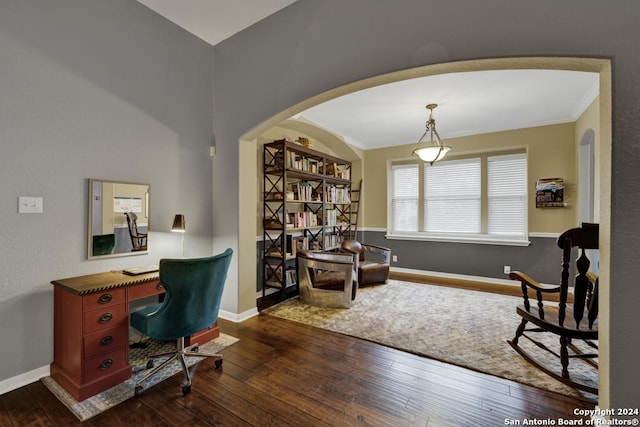 office area with dark hardwood / wood-style flooring and ornamental molding