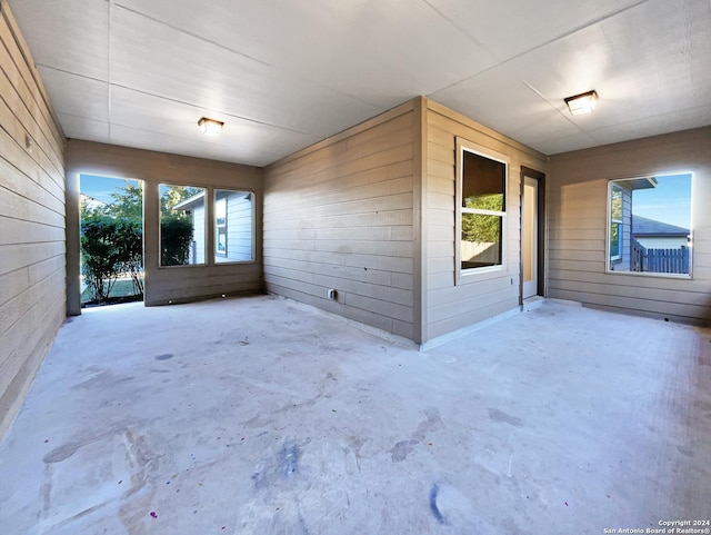 unfurnished sunroom with a healthy amount of sunlight