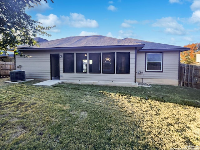 474 Wind Gust, New Braunfels, TX 78130 - back of house with a fenced backyard and a sunroom