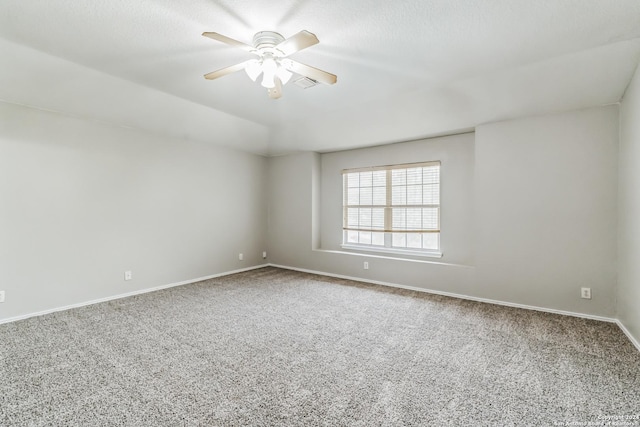 unfurnished room with carpet floors and ceiling fan