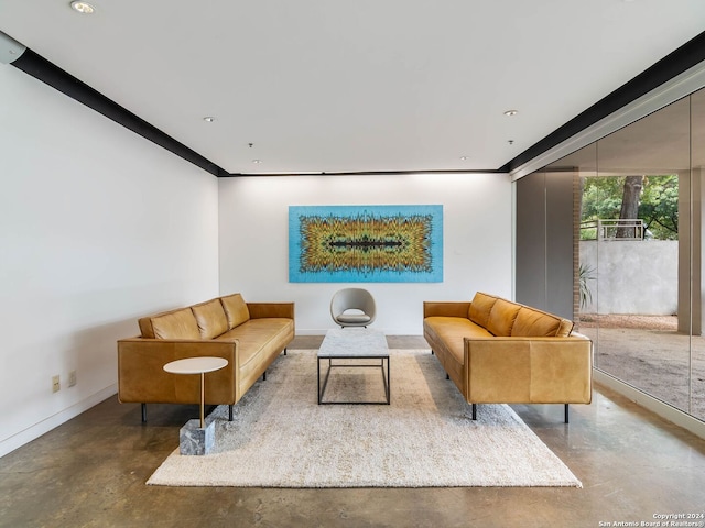 living room featuring concrete flooring