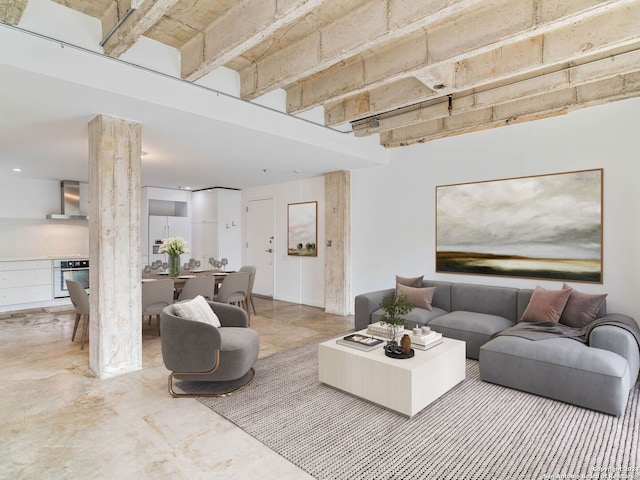 living room featuring concrete flooring