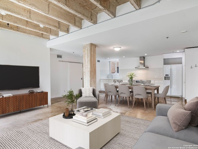 living room featuring a barn door